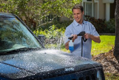 A Guide to Direct Response Television (DRTV) | Man washing car down with a sprayer